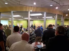 Crowd inside meeting